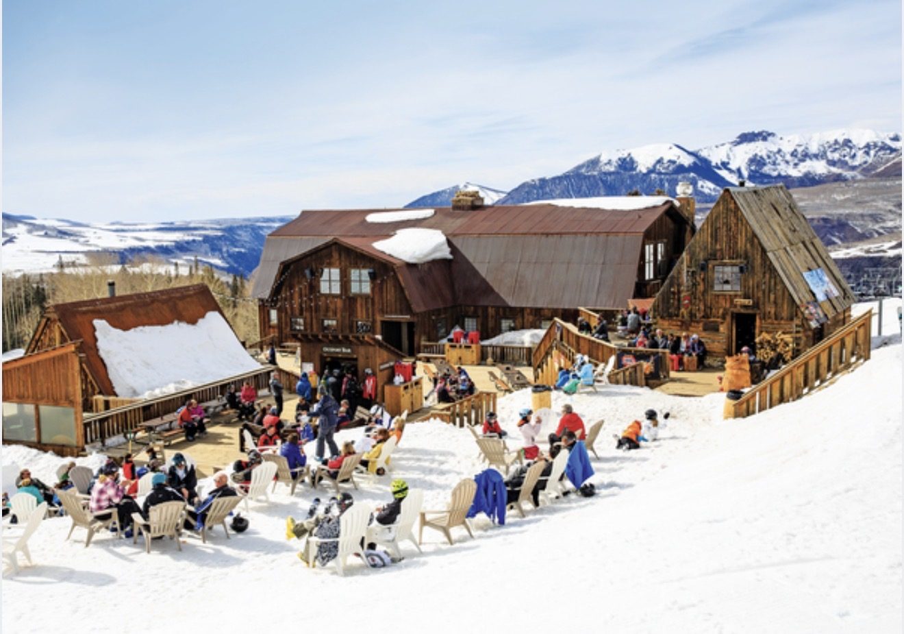 A full deck of guests in the sun at Gorrono Ranch above Telluride